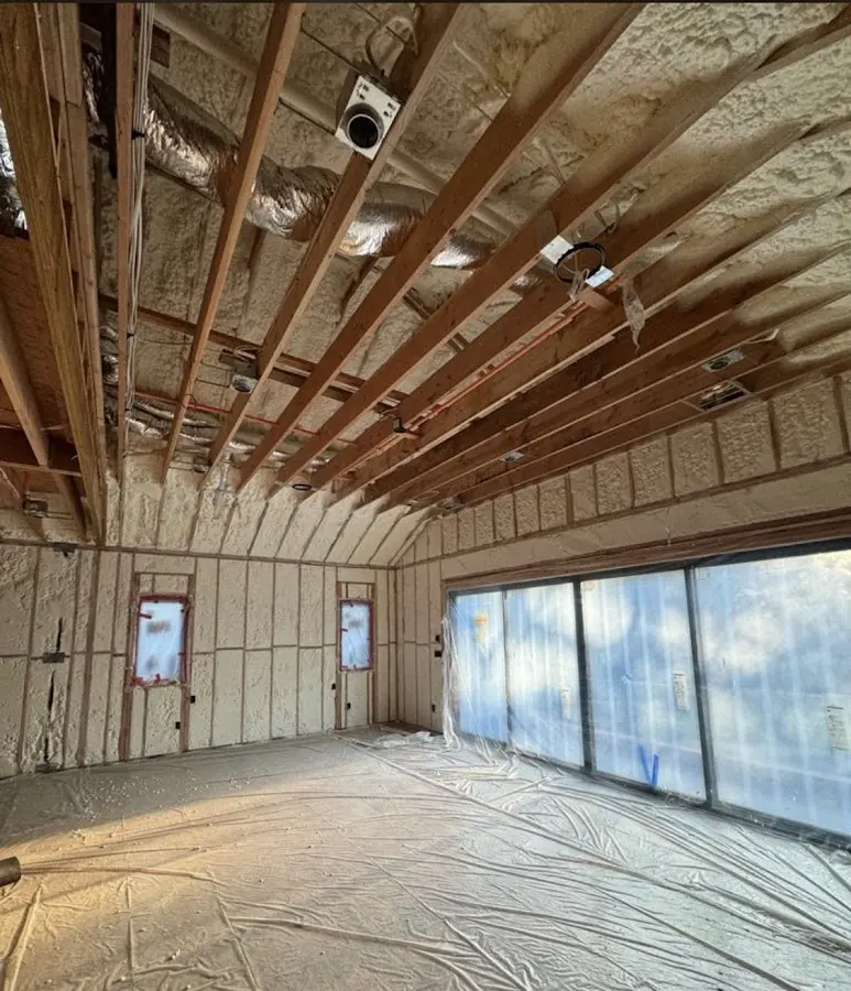 Interior walls and ceiling insulated with spray foam during new construction in Laurel
